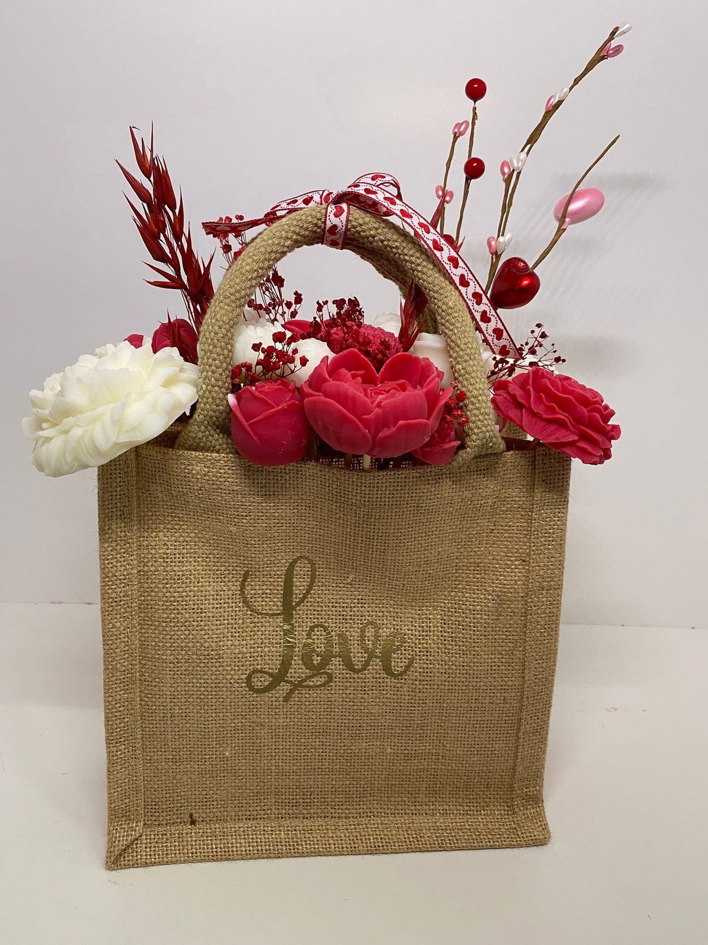 Le sac en jute et son bouquet éternel